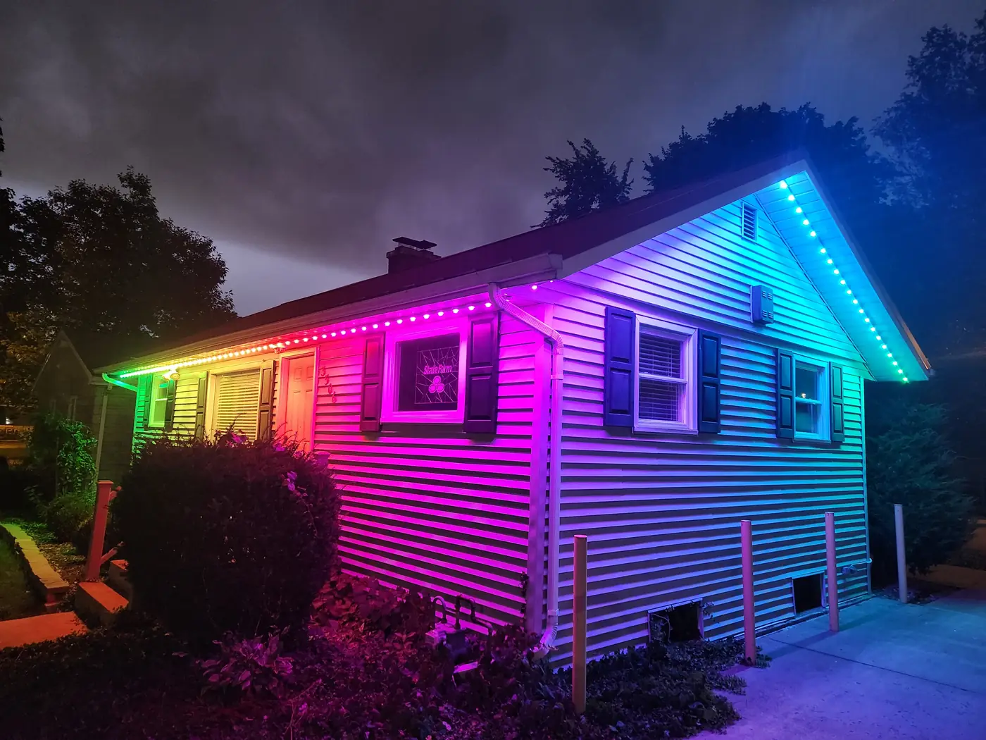Guenther State Farm with colorful LED lighting - side view